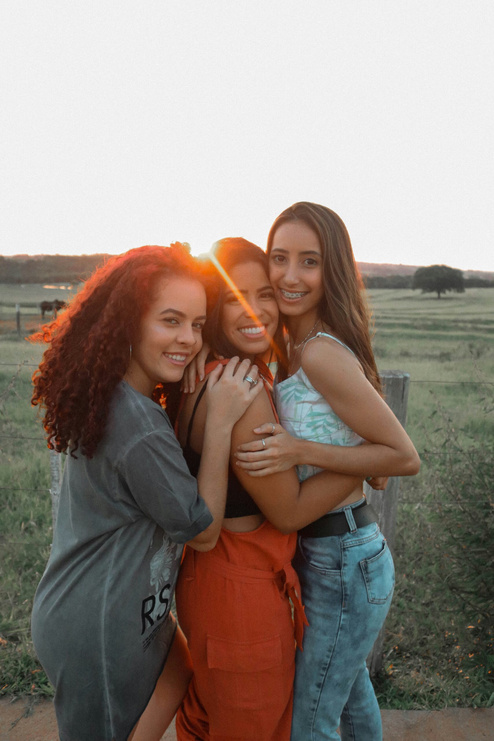 a group of young women standing next to each other