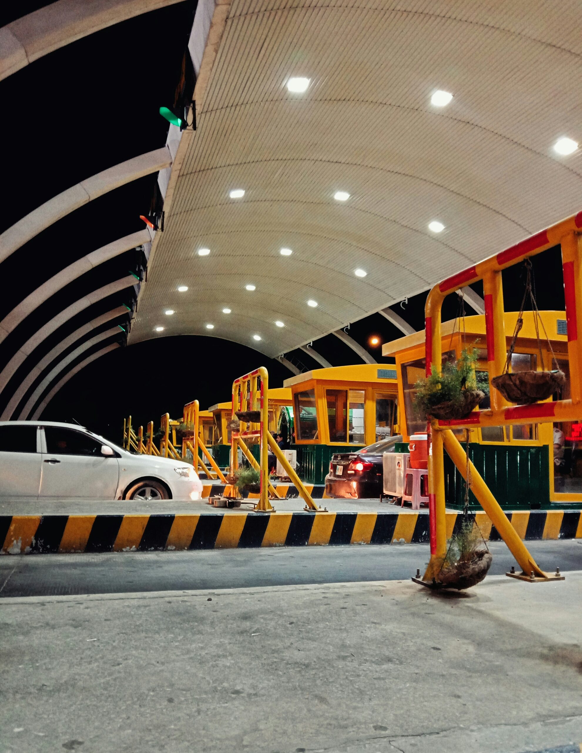 car passing through booth