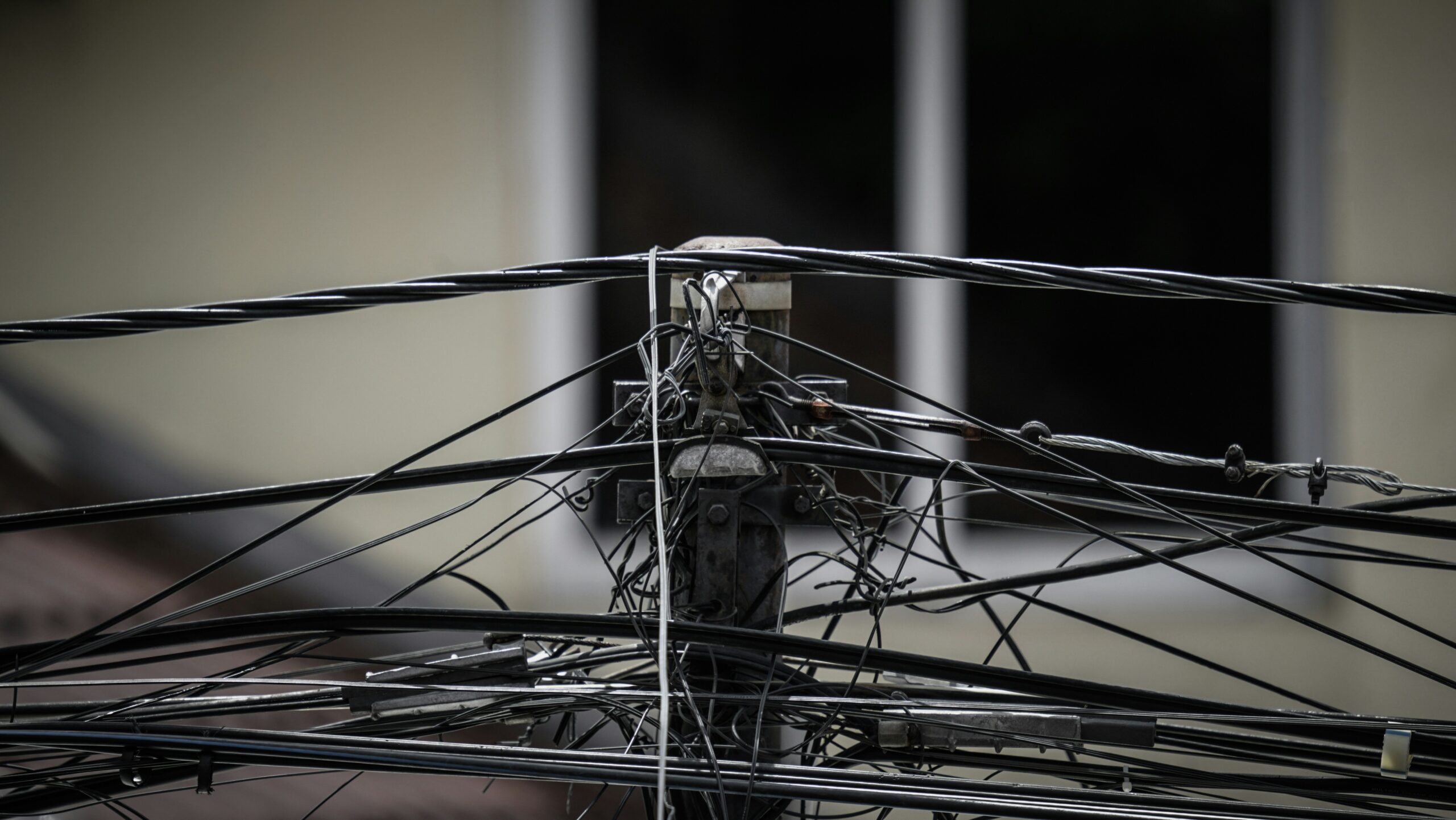 a close up of wires and wires on a pole