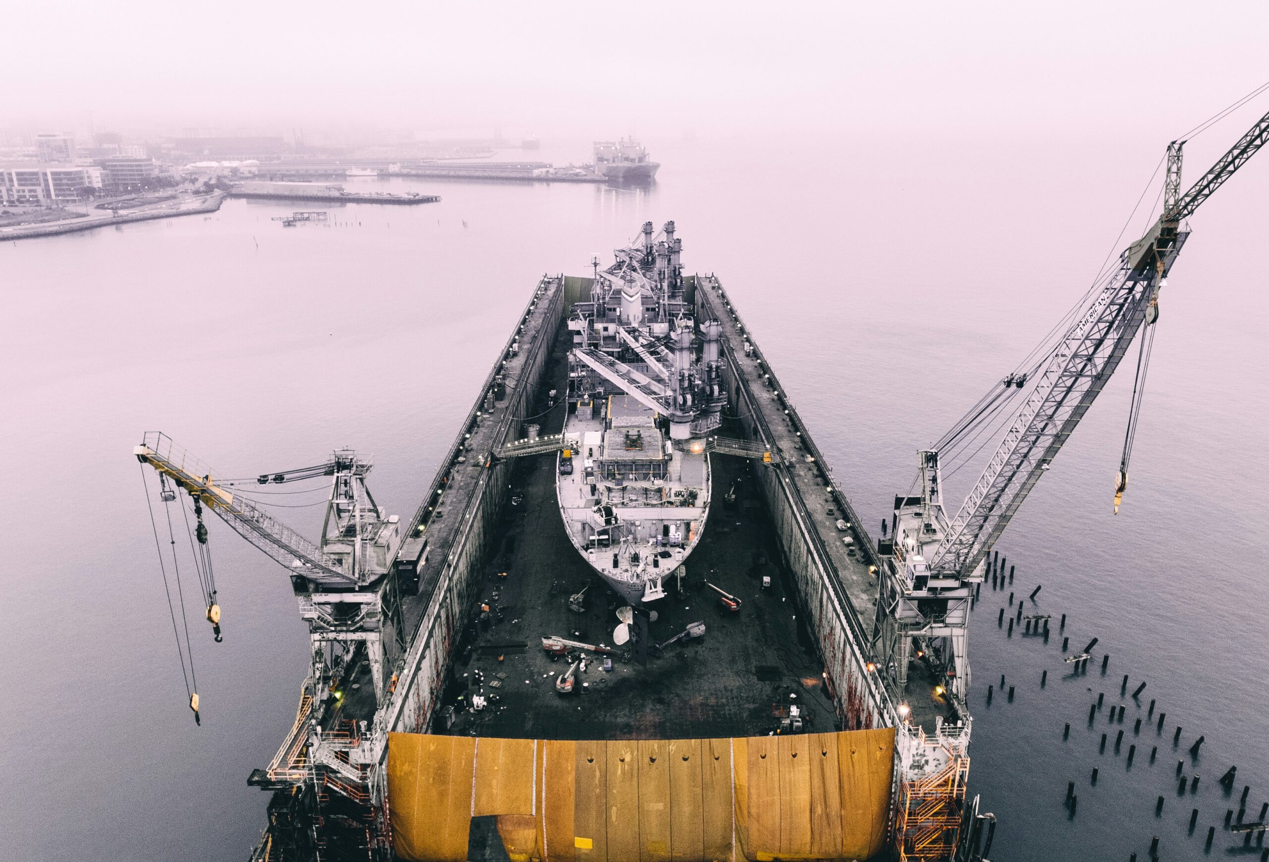 photo of ship on inside oil rig