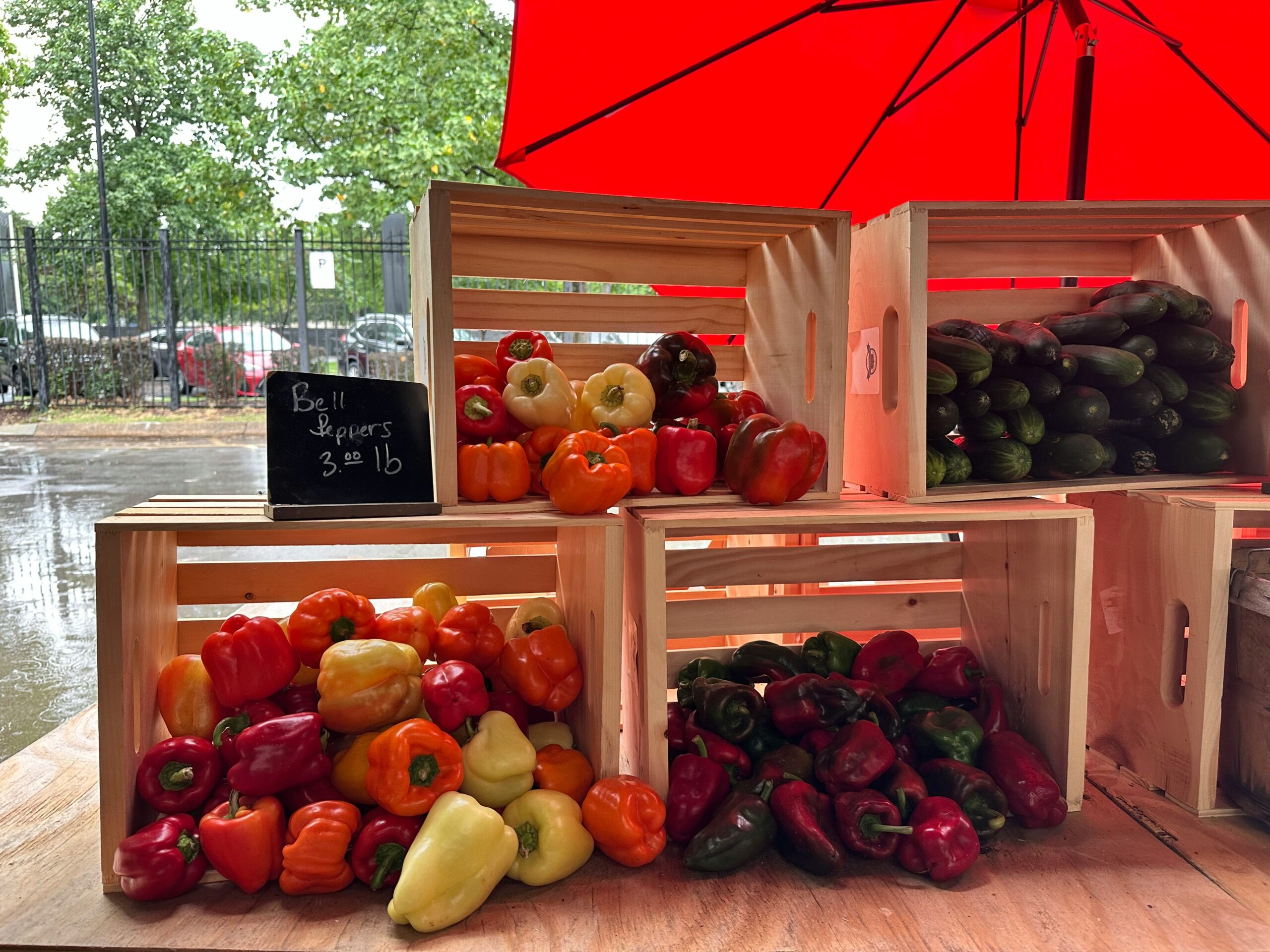 A pile of fruit sitting on top of a wooden table