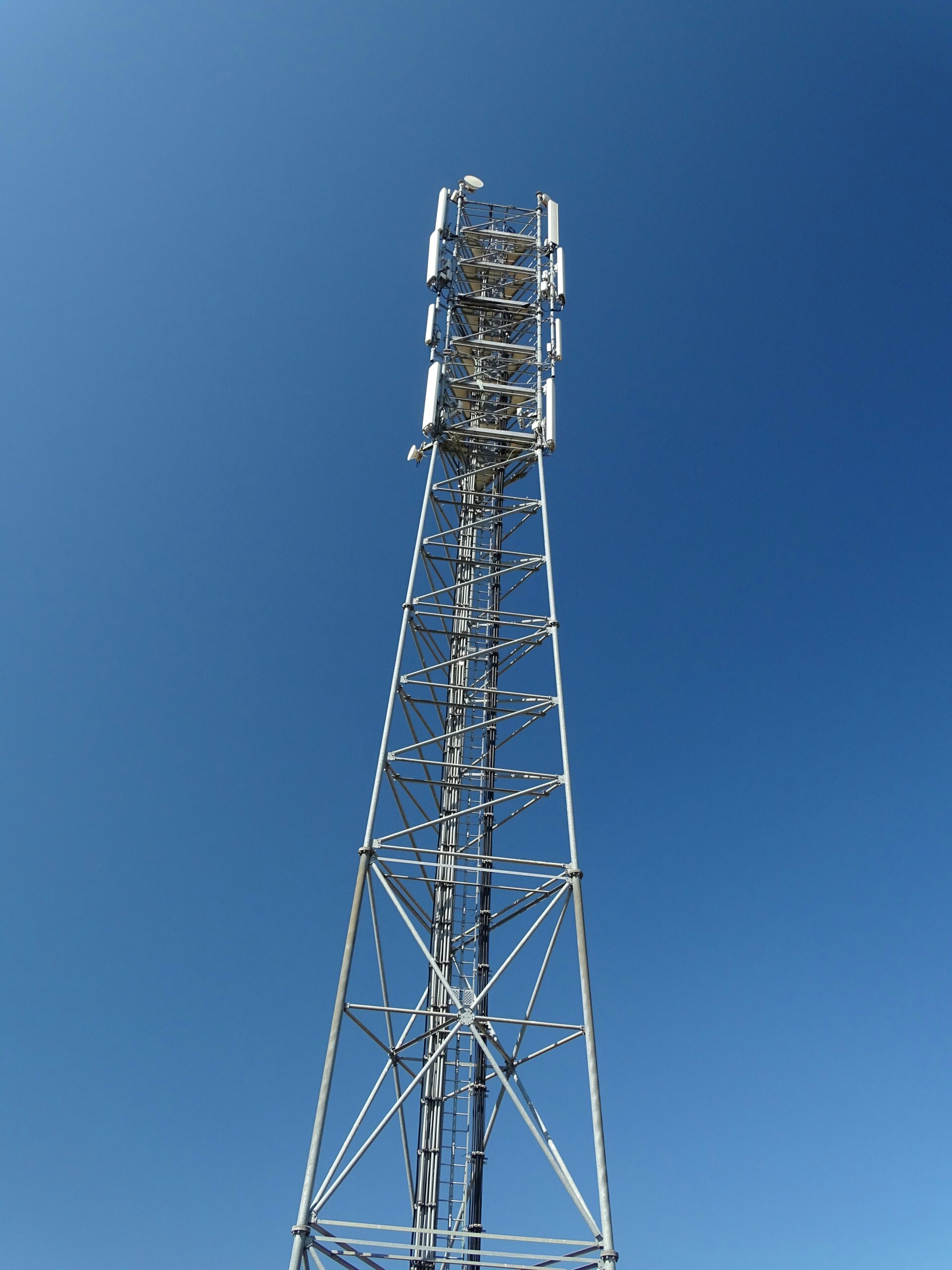 gray steel tower under blue sky during daytime