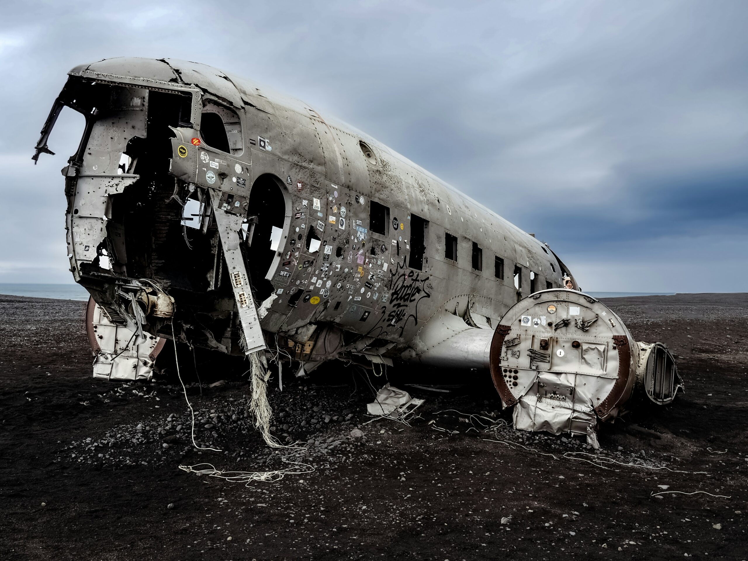 a plane that is sitting in the dirt