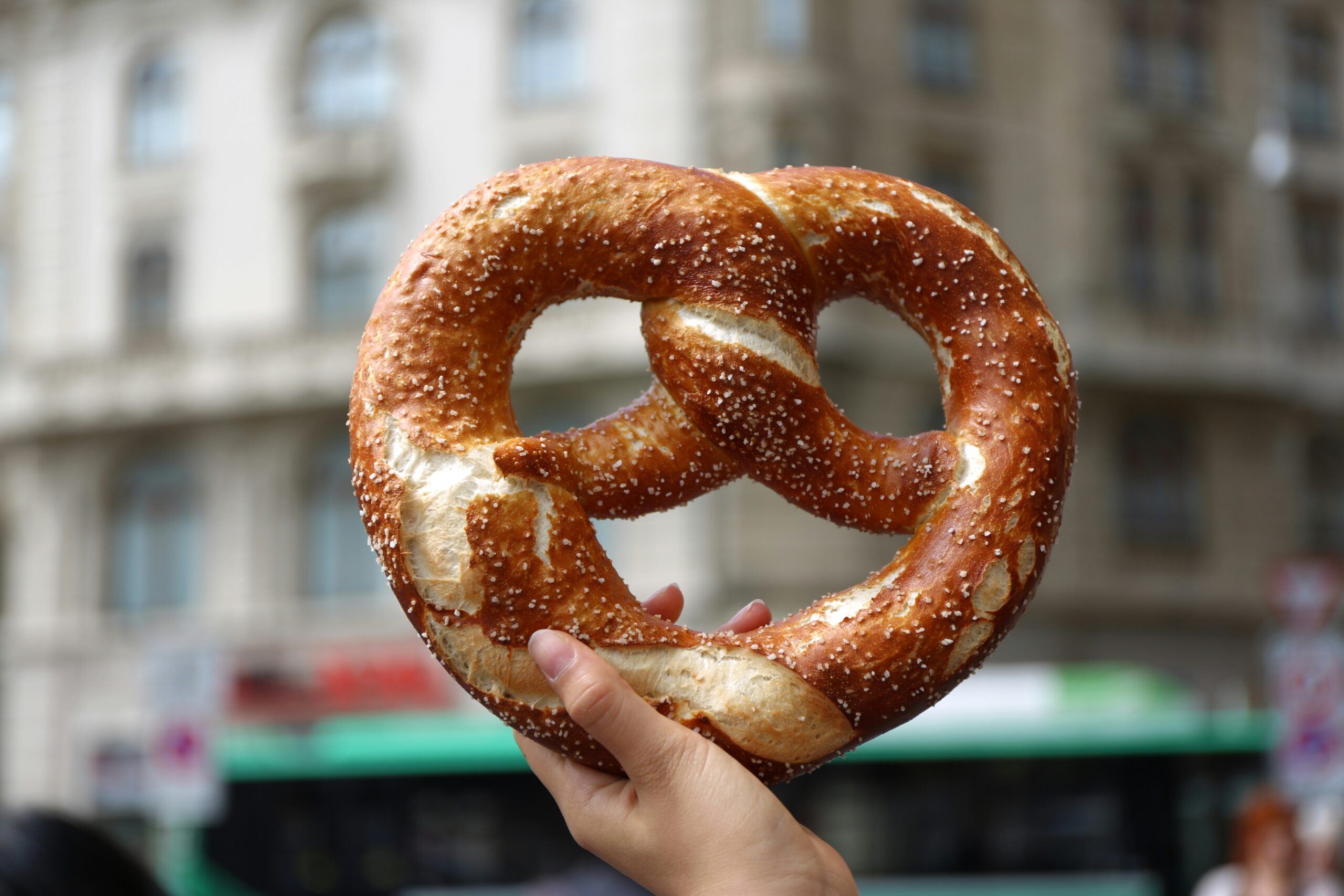 person holding pretzel