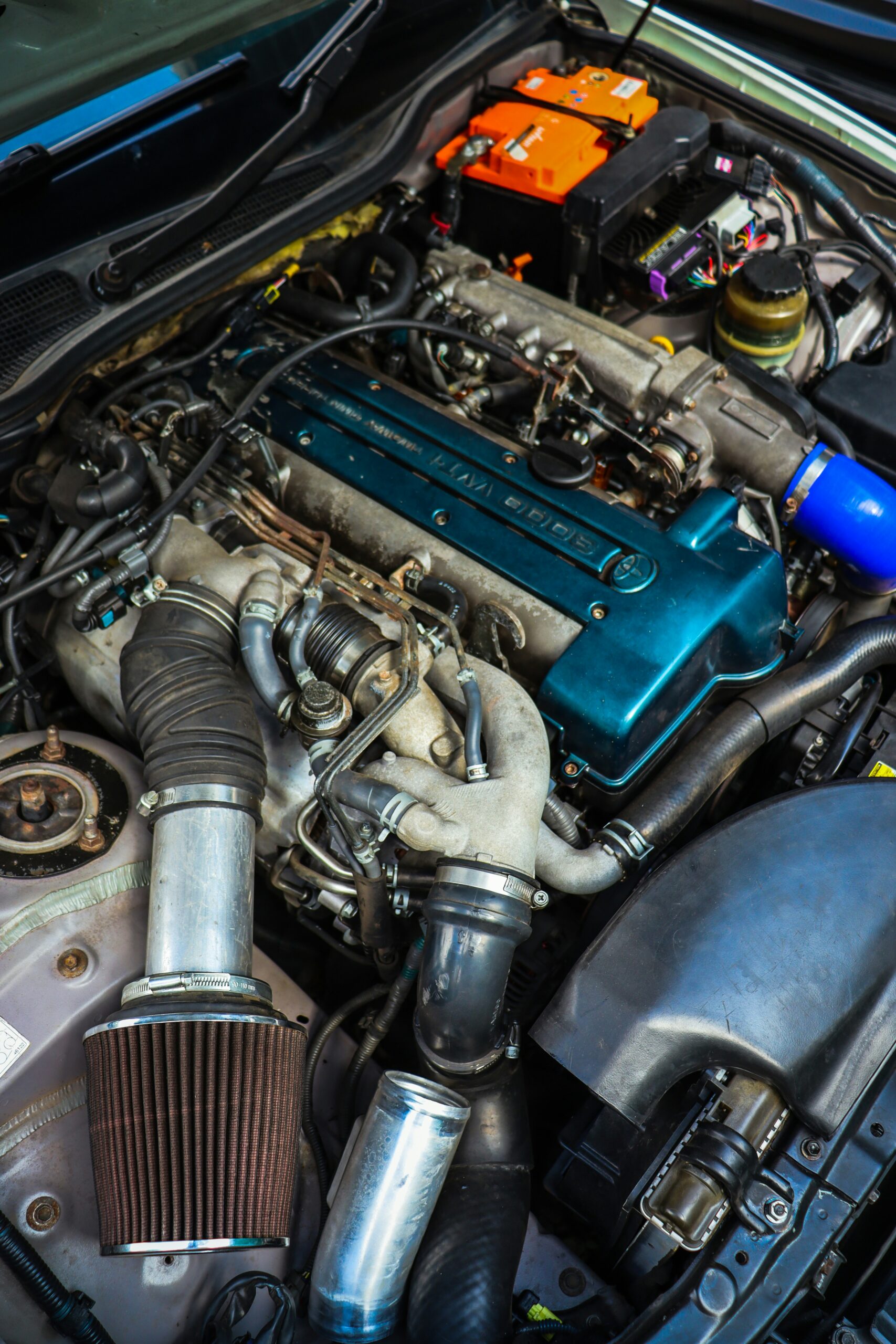 the engine of a car is shown with the hood open