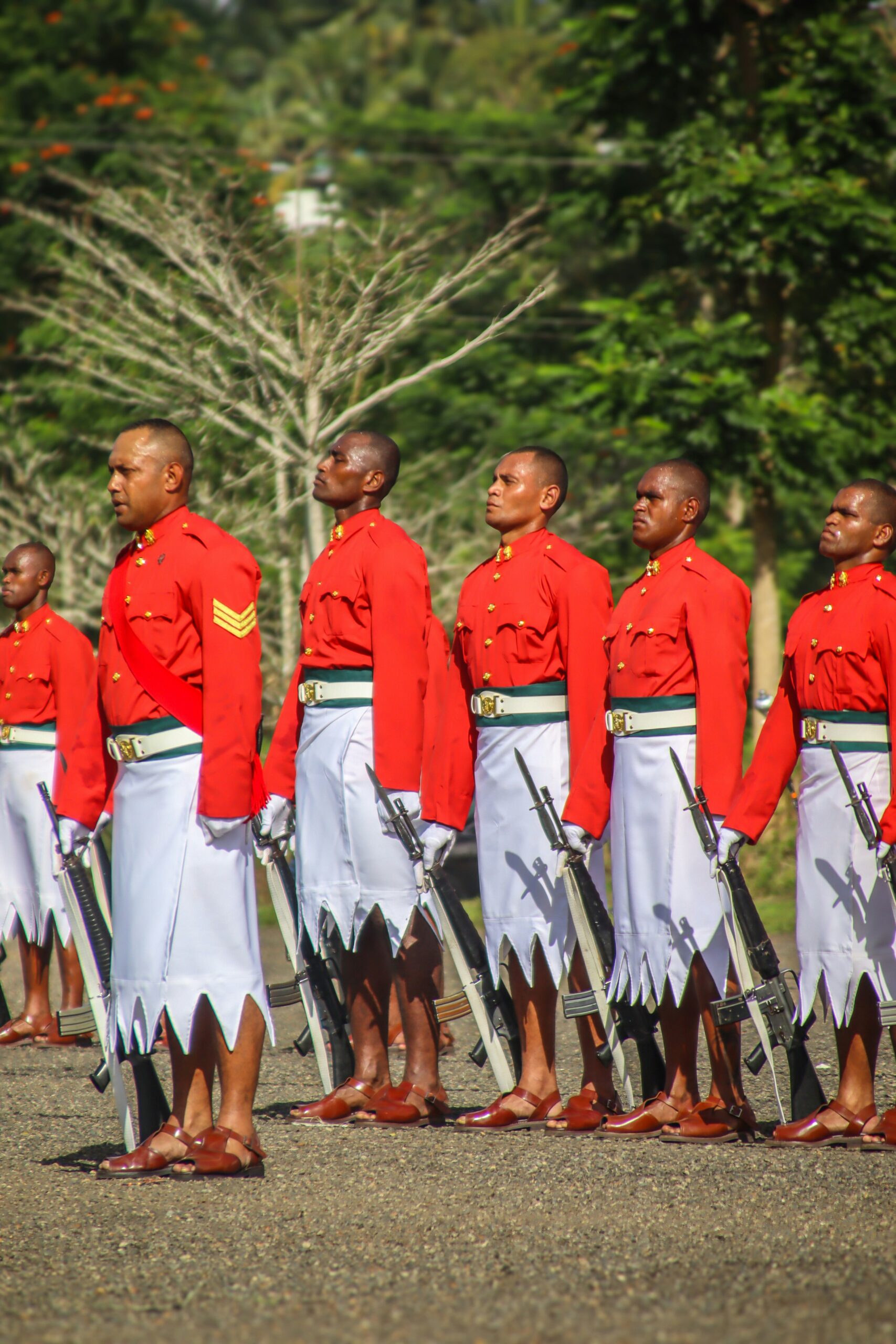 a group of men in red and white uniforms