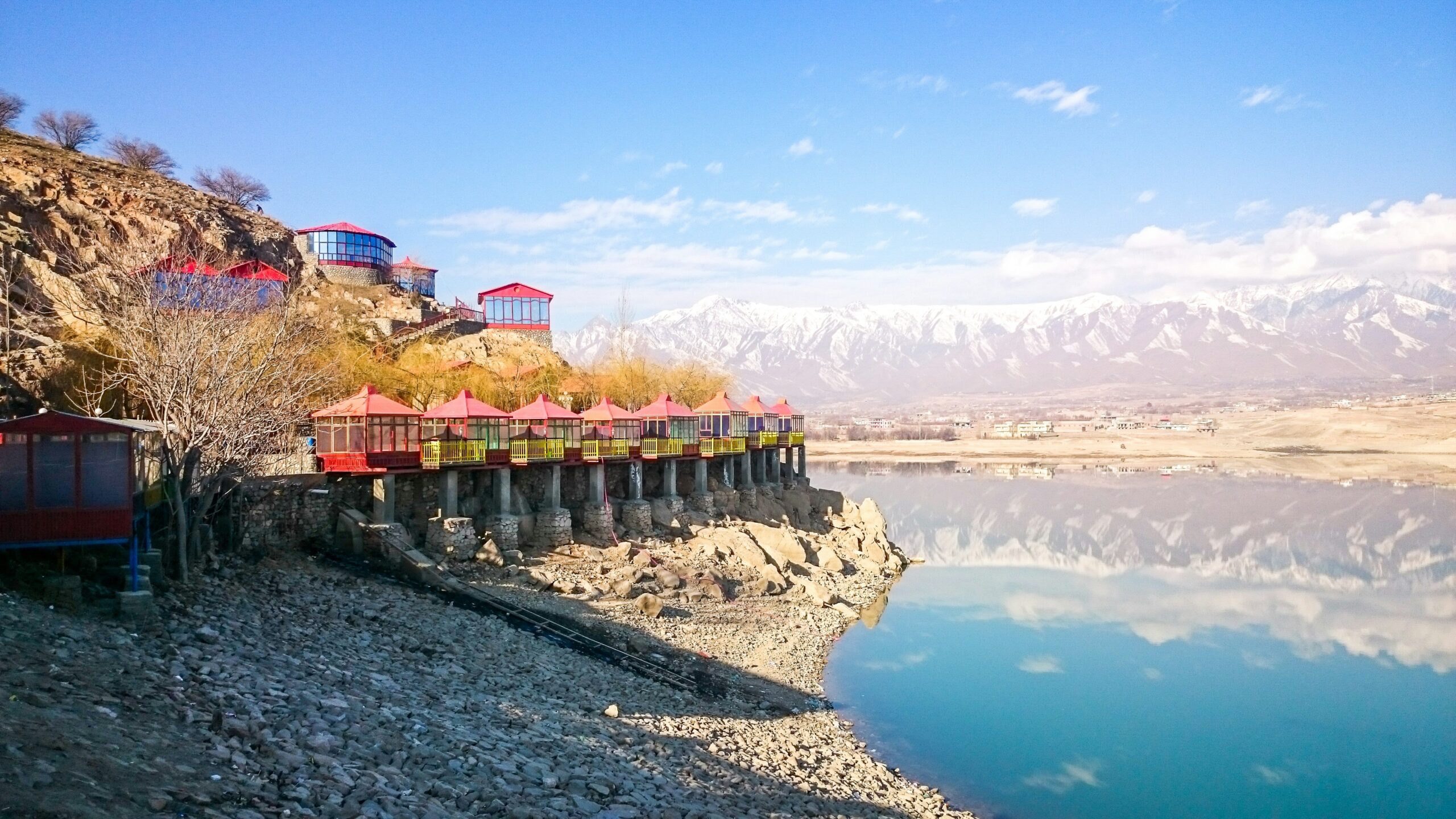 a large body of water surrounded by mountains